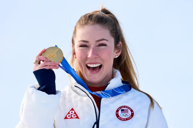 Mikaela Shiffrin shows her gold medal at 2026 Winter Olympics