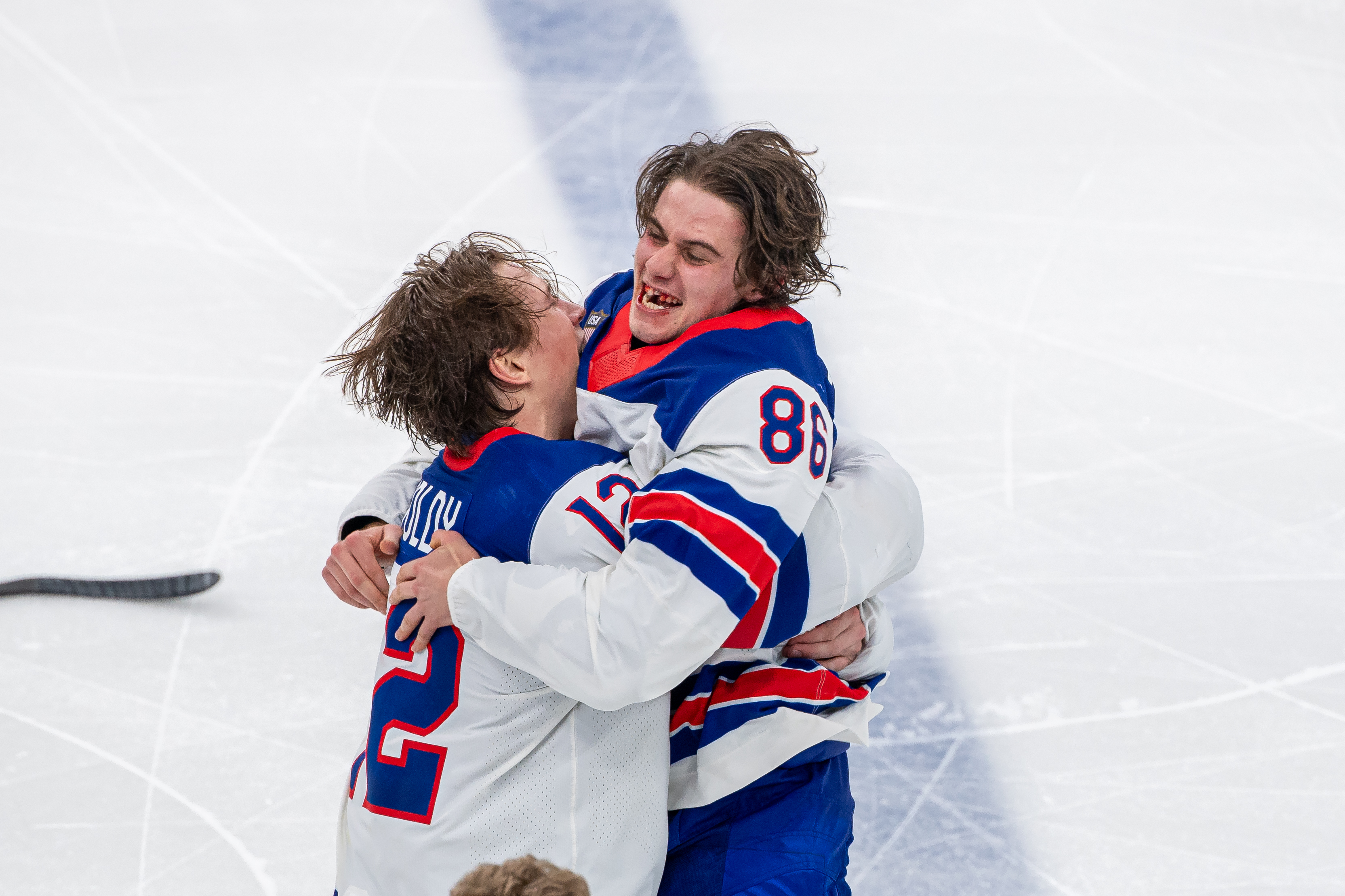 Jack Hughes Embraced in Viral Moment by Teammates After Gold Medal Win