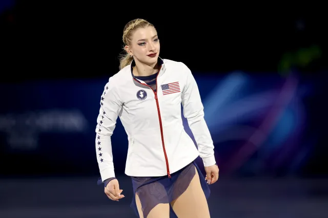 MILAN, ITALY - FEBRUARY 19: Amber Glenn of Team United States is introduced in Women's Single Skating - Free Skating on day thirteen of the Milano Cortina 2026 Winter Olympic games at Milano Ice Skating Arena on February 19, 2026 in Milan, Italy. (Photo by Jamie Squire/Getty Images)