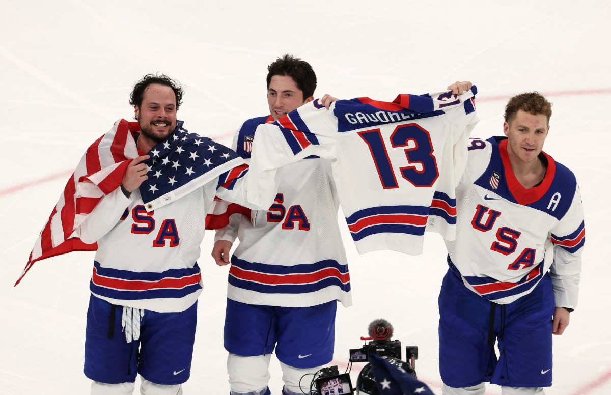 What USA did immediately after beating Canada for gold left fans emotional