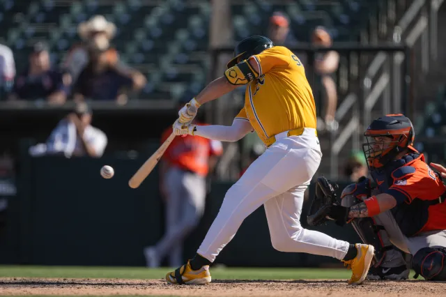 Max Schuemann #12 of the Athletics hits a sac rbi in the bottom of the ninth inning against the Houston Astros at Sutter Health Park on September 25, 2025 in Sacramento, California.