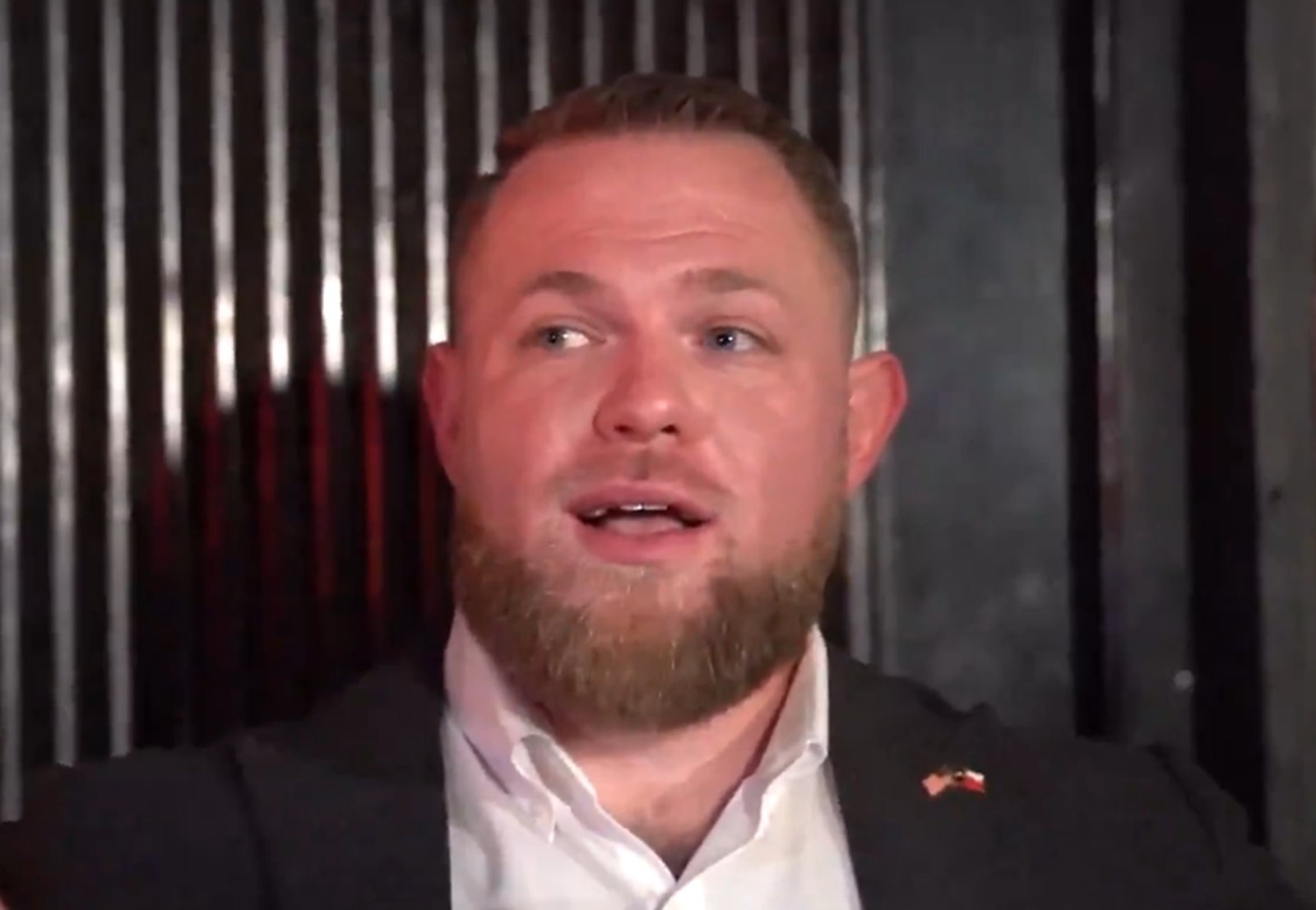 Taylor Rehmet makes a victory speech to supporters.
