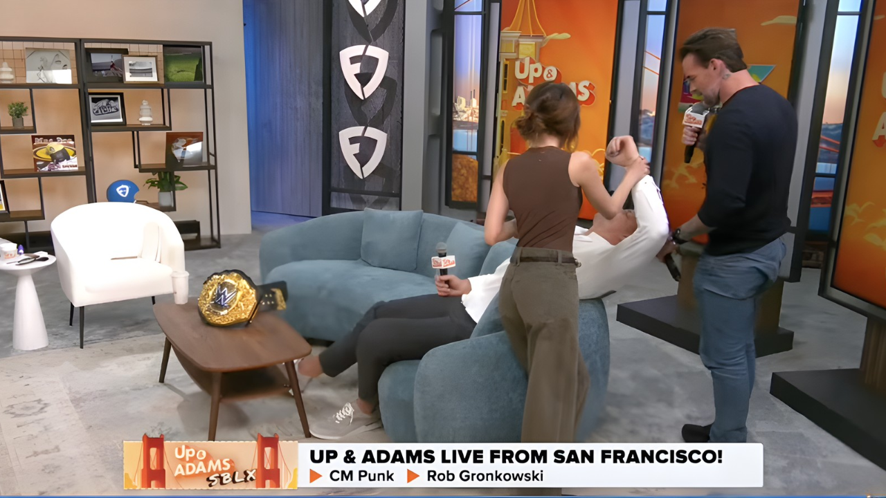 Kay Adams Uses WWE Finisher on Rob Gronkowski With CM Punk's Help