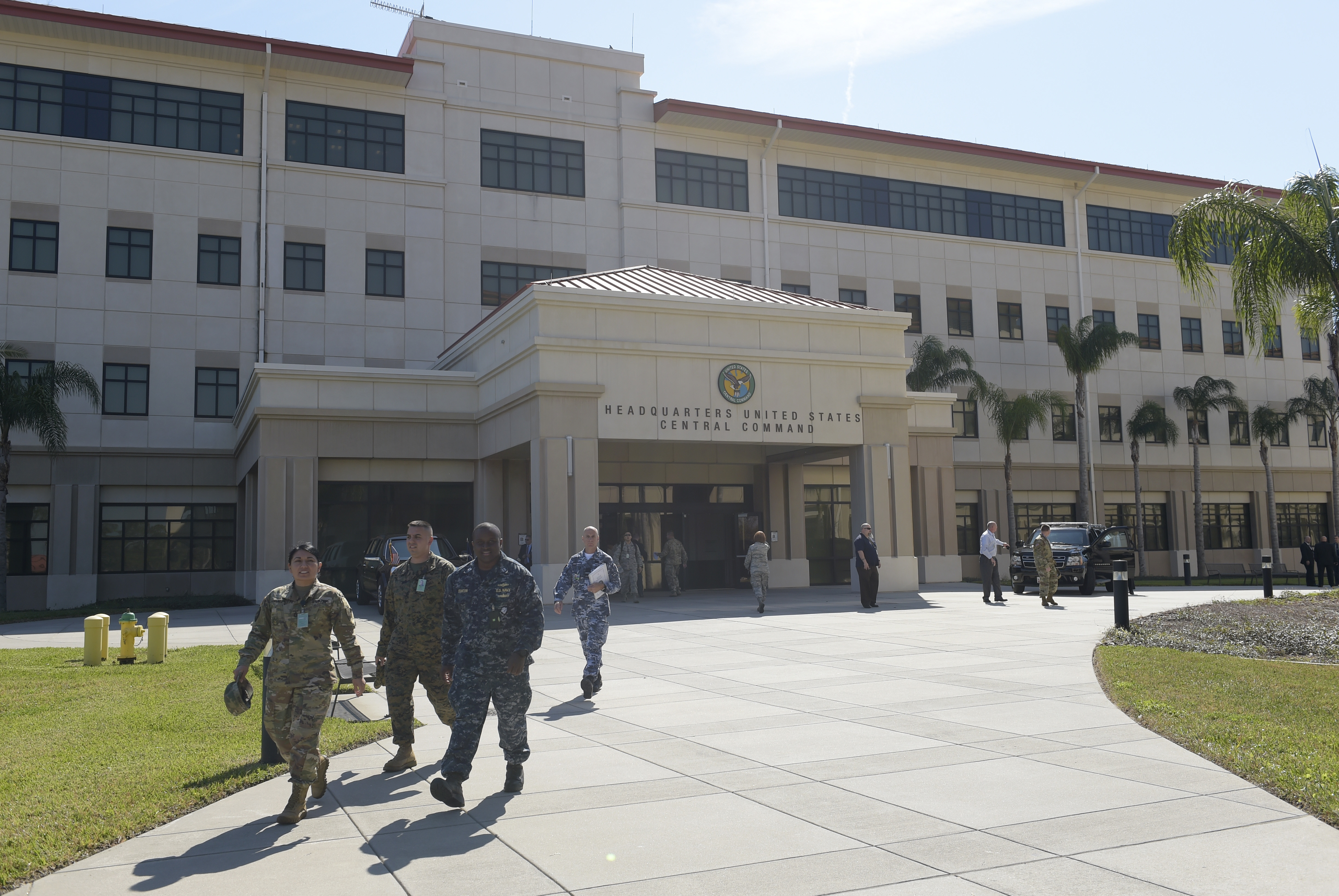 Siblings Charged After IED Found at MacDill AFB, Brother Flees to China