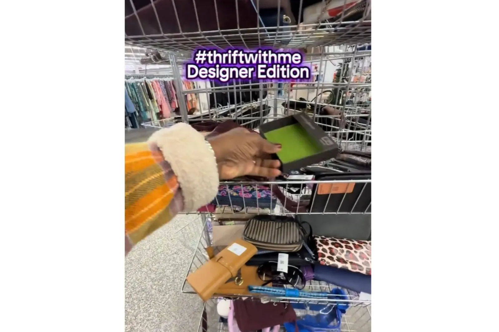 A screenshot from a TikTok video of woman who thrifts two luxury designer wallets on same day.