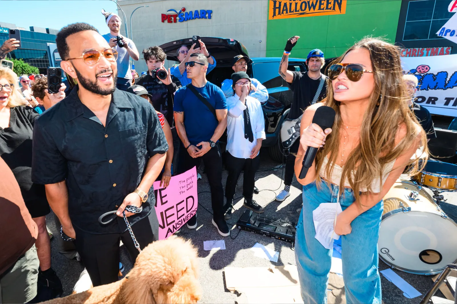 John Legend and Chrissy Teigen at rally