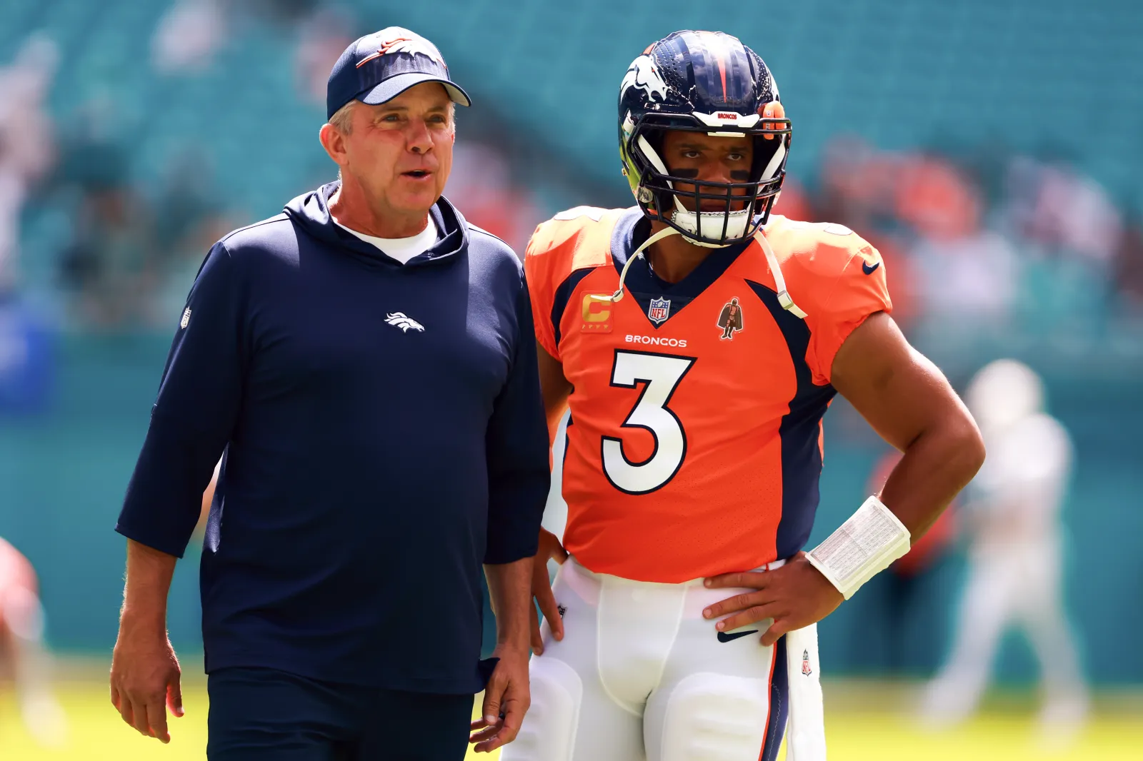 Denver Broncos head coach Sean Payton and former QB Russell Wilson