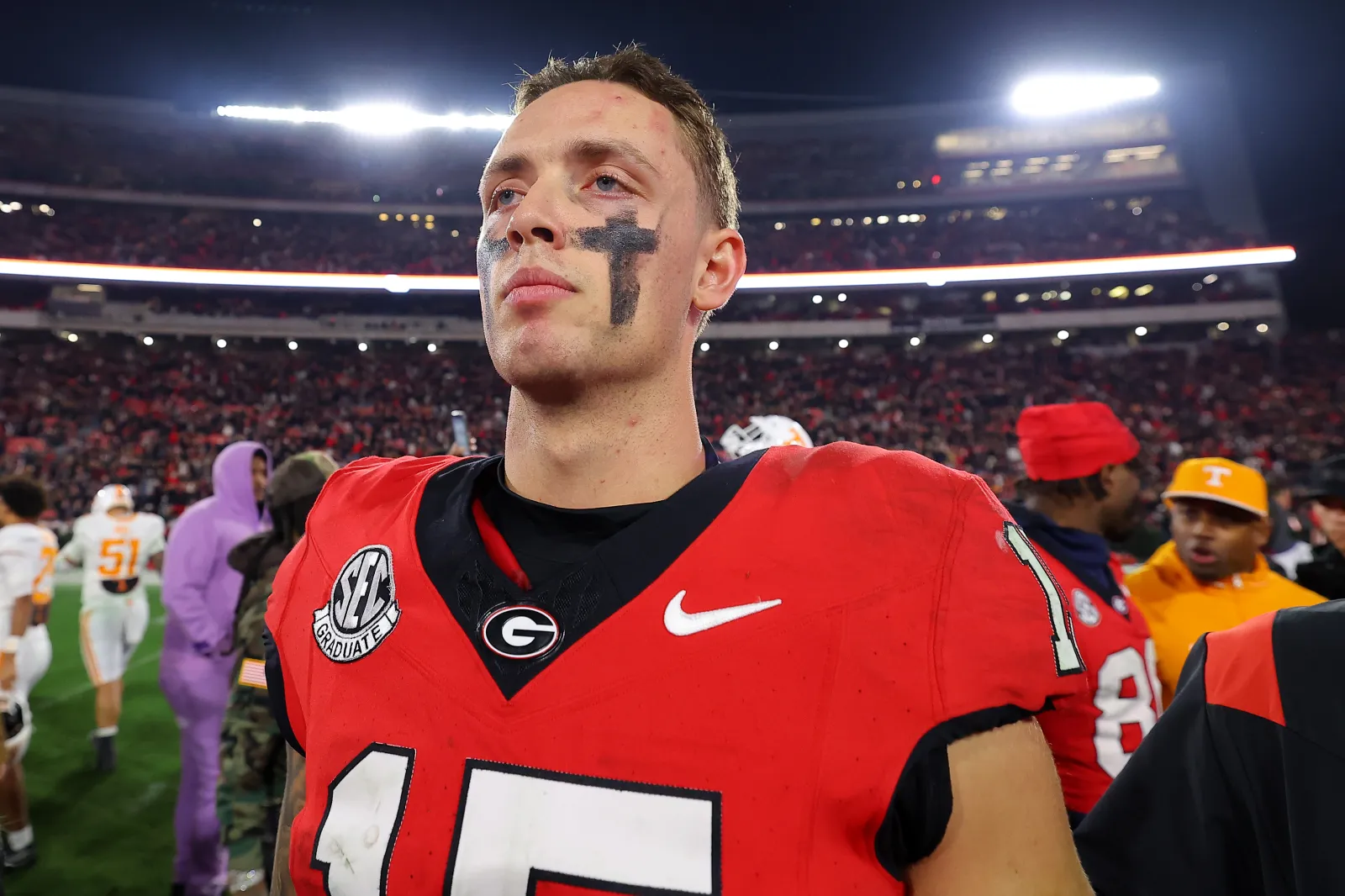 Carson Beck #15 of the Georgia Bulldogs looks on after defeating the Tennessee Volunteers 31-17 at Sanford Stadium on November 16, 2024 in Athens, Georgia.