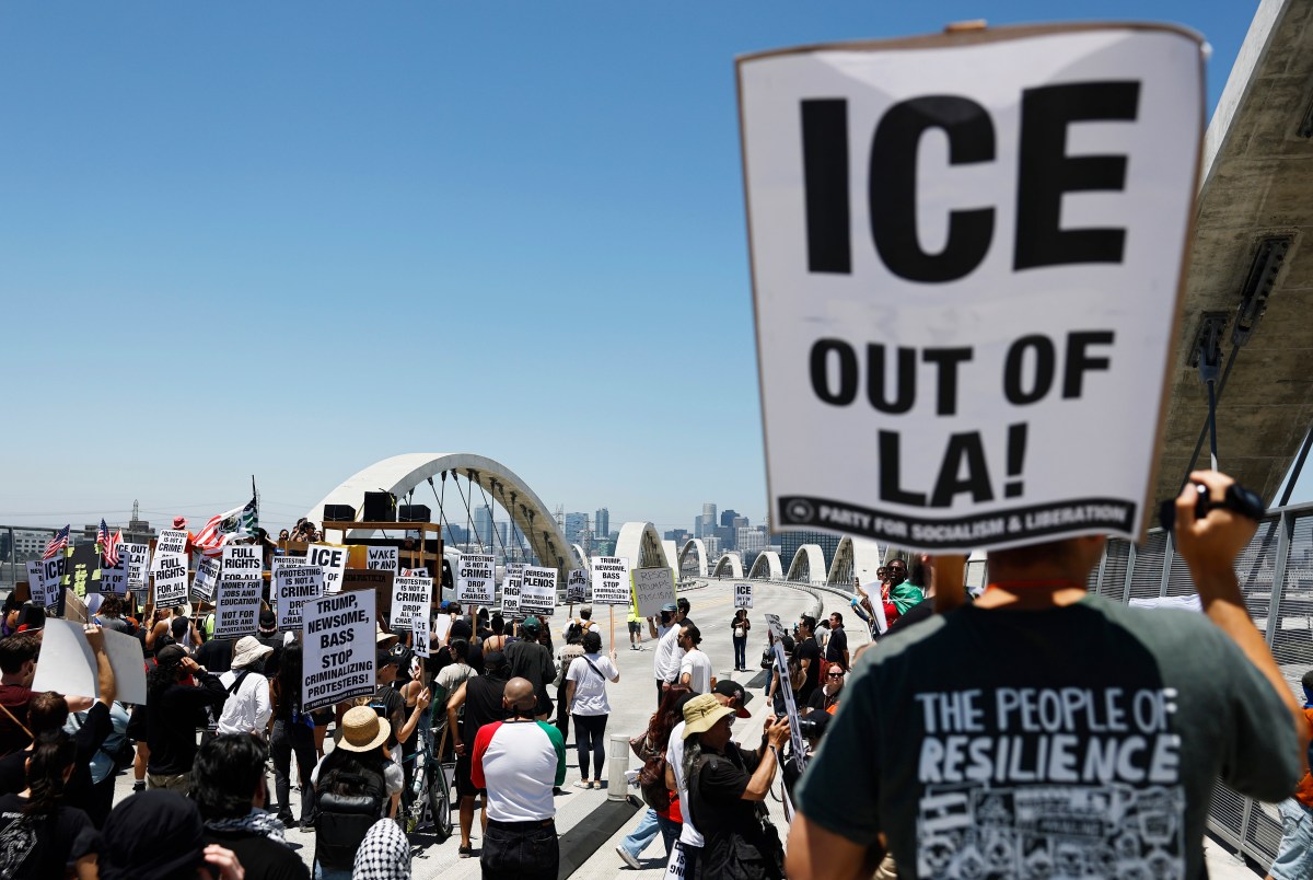 Anti-ICE protester dragged on car after confronting immigration agent