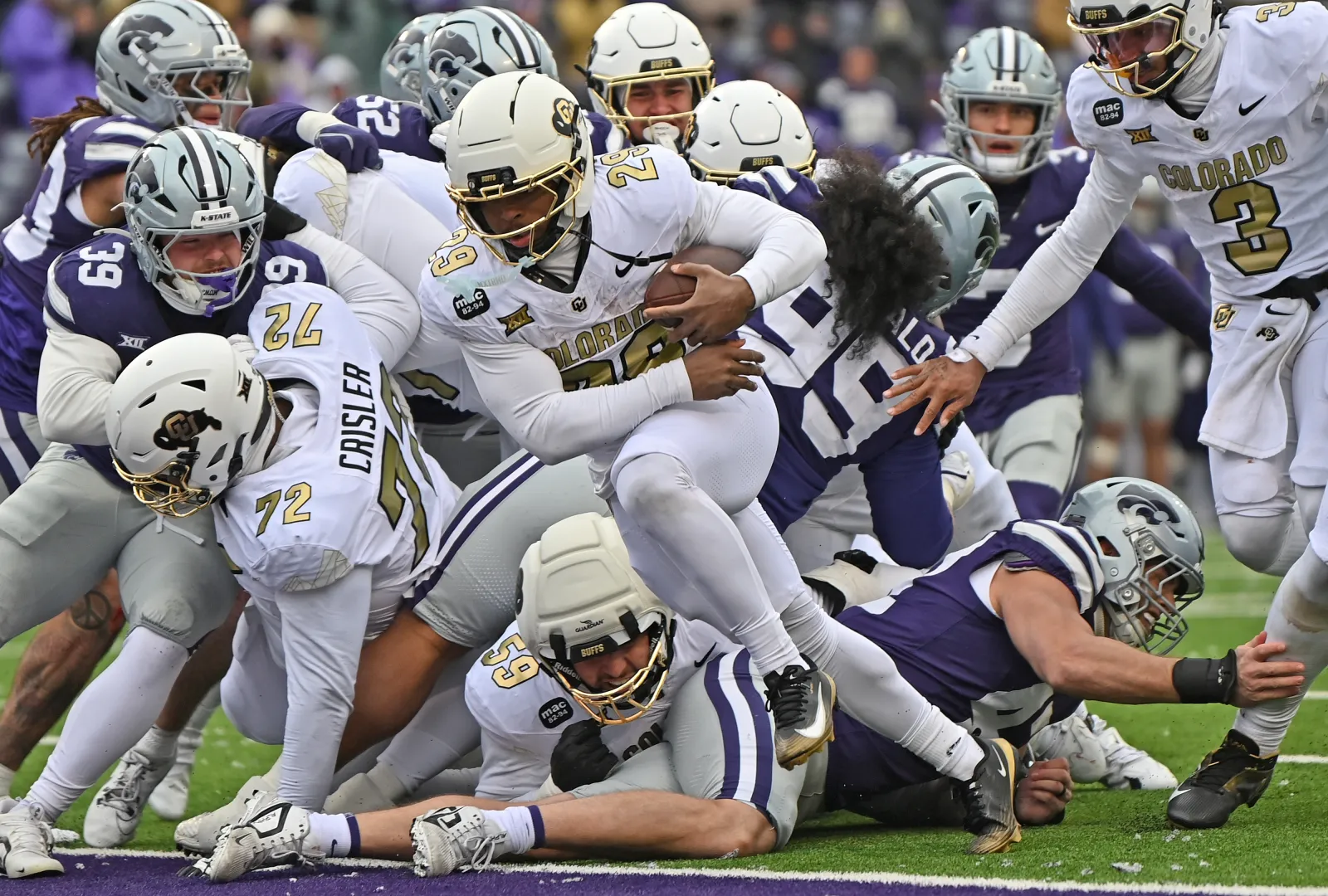 Running back Micah Welch #29 of the Colorado Buffaloes rushes for a touchdown against the Kansas State Wildcats in the second half at Bill Snyder Family Football Stadium on November 29, 2025 in Manhattan, Kansas.