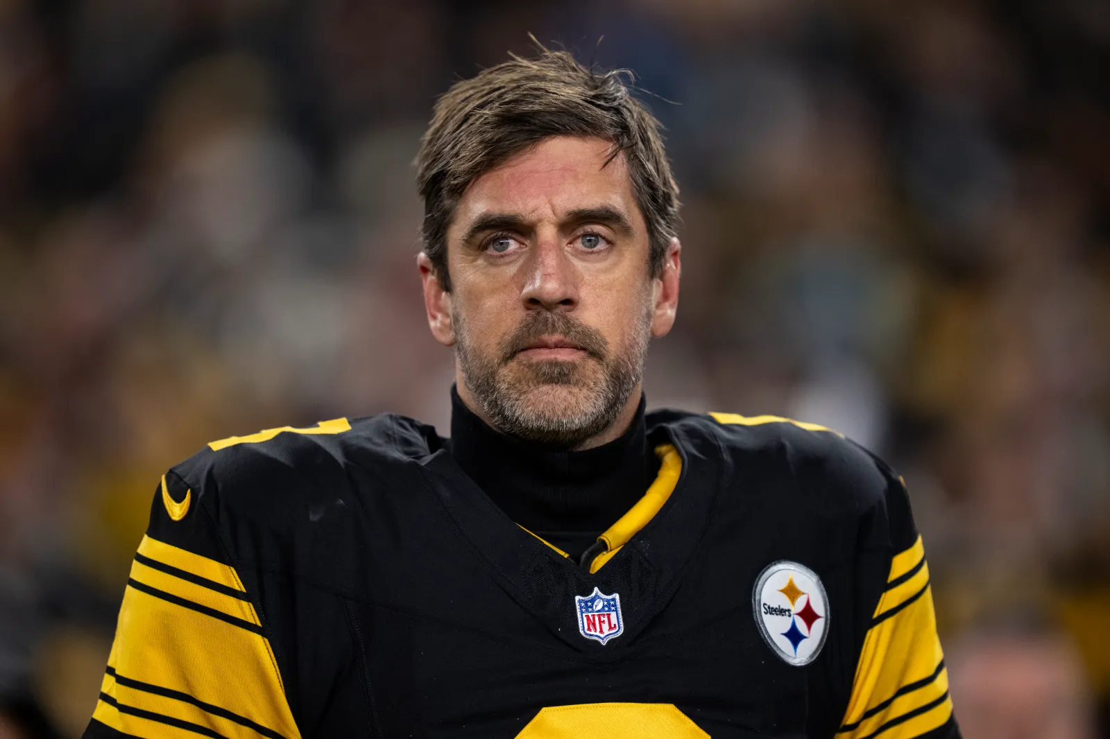 PITTSBURGH, PENNSYLVANIA - DECEMBER 15: Aaron Rodgers #8 of the Pittsburgh Steelers looks on during the national anthem prior to an NFL football game against the Miami Dolphins at Pennsylvania on December 15, 2025 in Pittsburgh, Pennsylvania. (Photo by Michael Owens/Getty Images)