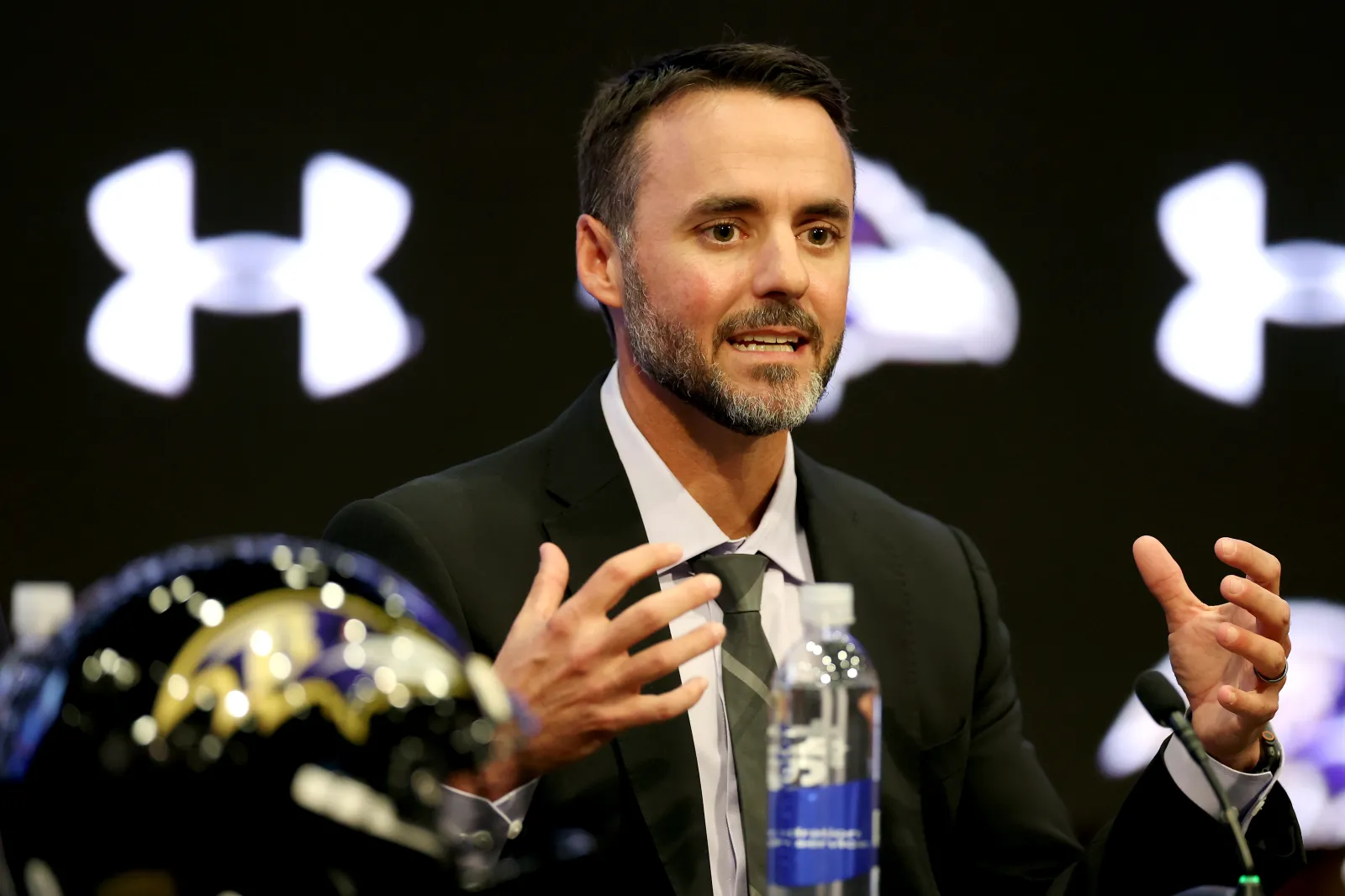 New Baltimore Ravens head coach Jesse Minter is introduced during a news conference at Under Armour Performance Center Baltimore Ravens on January 29, 2026 in Owings Mills, Maryland.