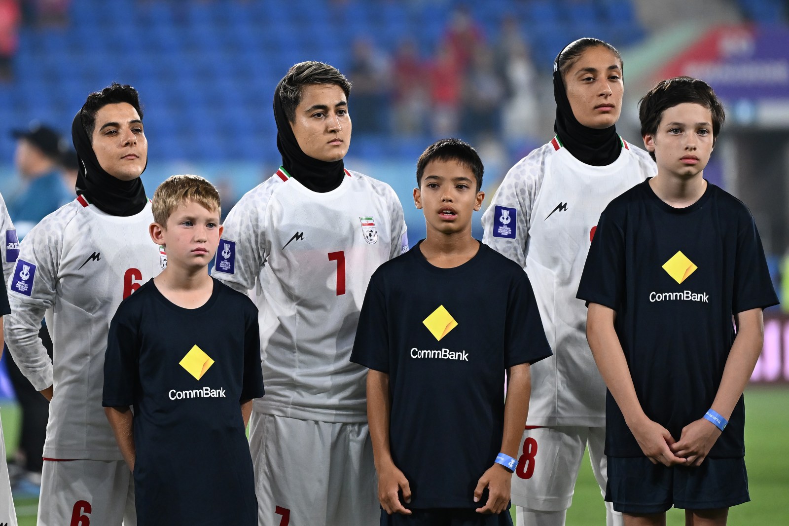 Iran women's national soccer team players standing during the national anthem at Gold Coast Stadium during the AFC Women's Asian Cup in Australia, March 2026