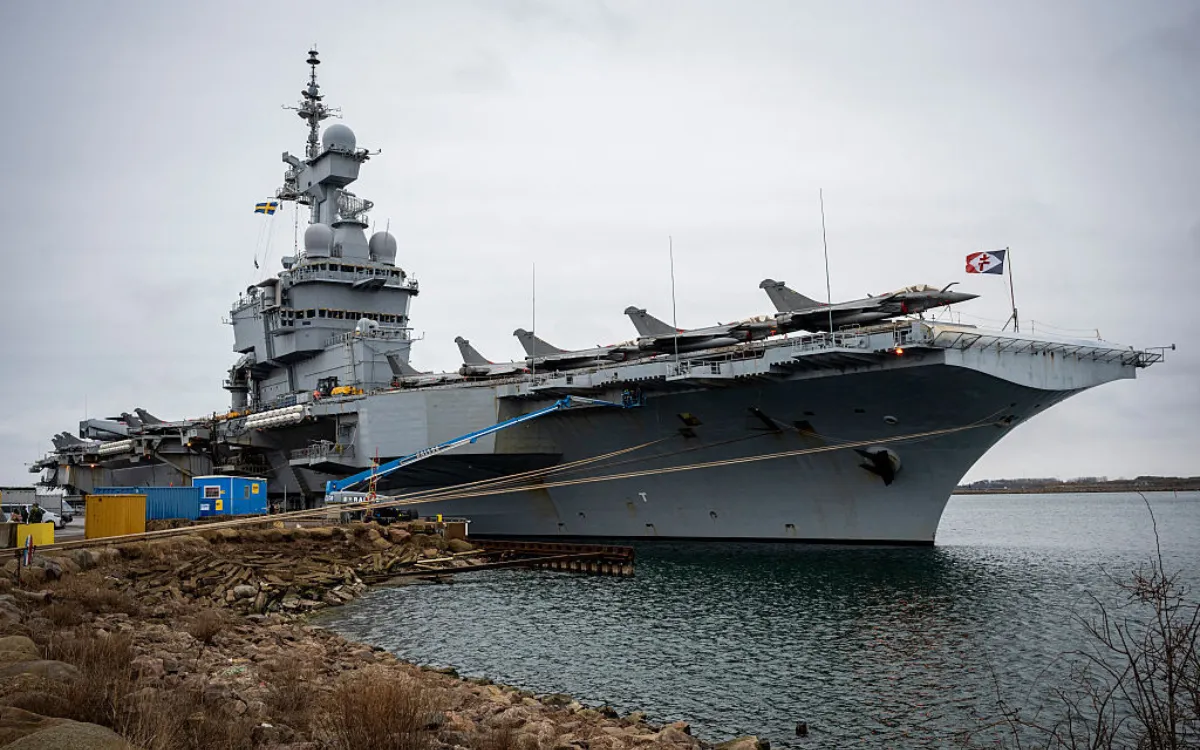 A picture taken on February 25, 2026, shows the French aircraft carrier Charles De Gaulle (R91) during a media tour while moored at the quay of the North Port in Malmo, Sweden.