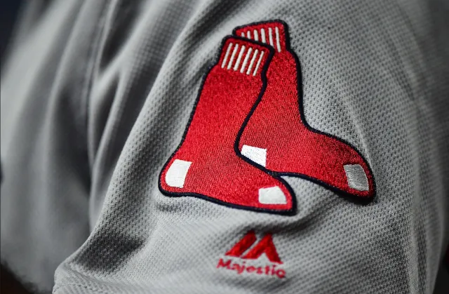 The Boston Red Sox released a one-promising minor-league prospect on Friday.