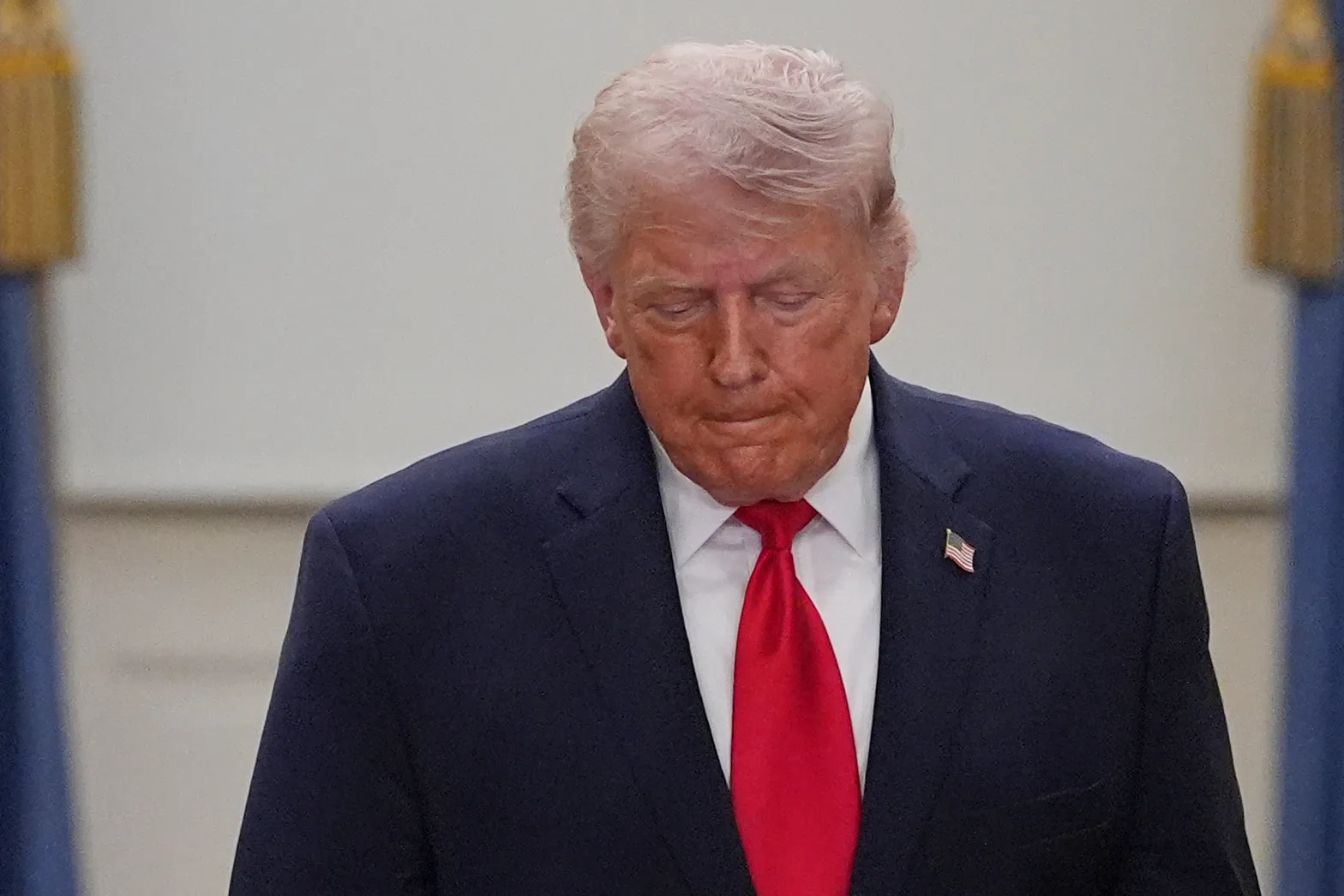 President Donald Trump walks from the Blue Room to speak about the Iran war from the Cross Hall of the White House on Wednesday, April 1, 2026, in Washington.
