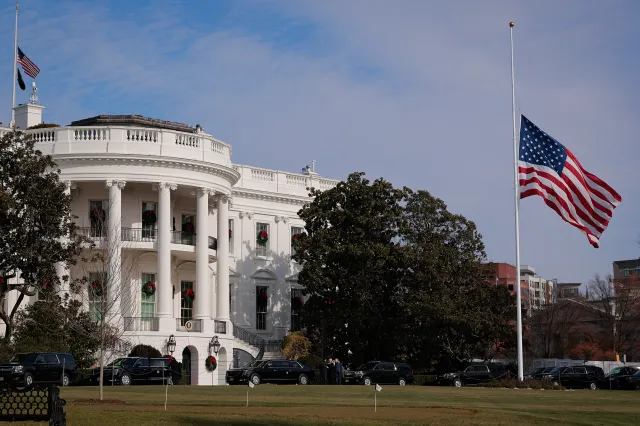 File image: The flag on the south lawn of the White House flies at half staff on December 04, 2025 in Washington, DC.