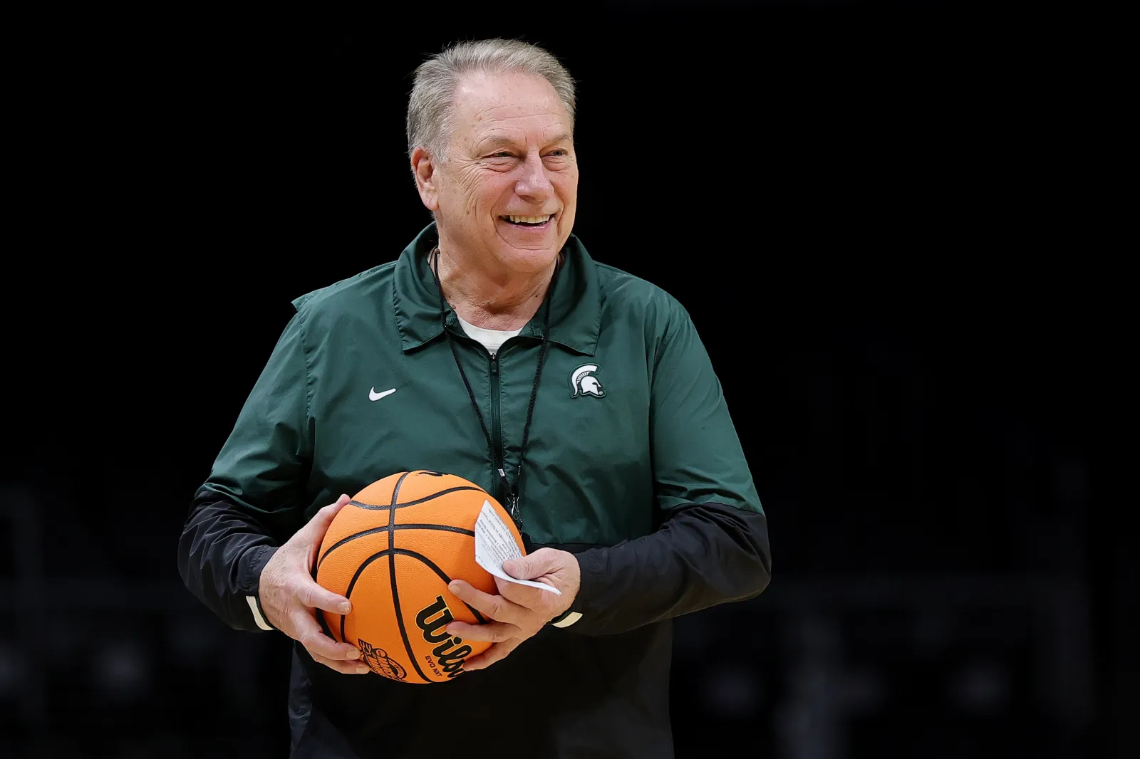 Head Coach Tom Izzo of the Michigan State Spartans handles a ball during warm ups during a practice session ahead of the Sweet 16 in the South Regional of the NCAA men's basketball tournament at State Farm Arena.