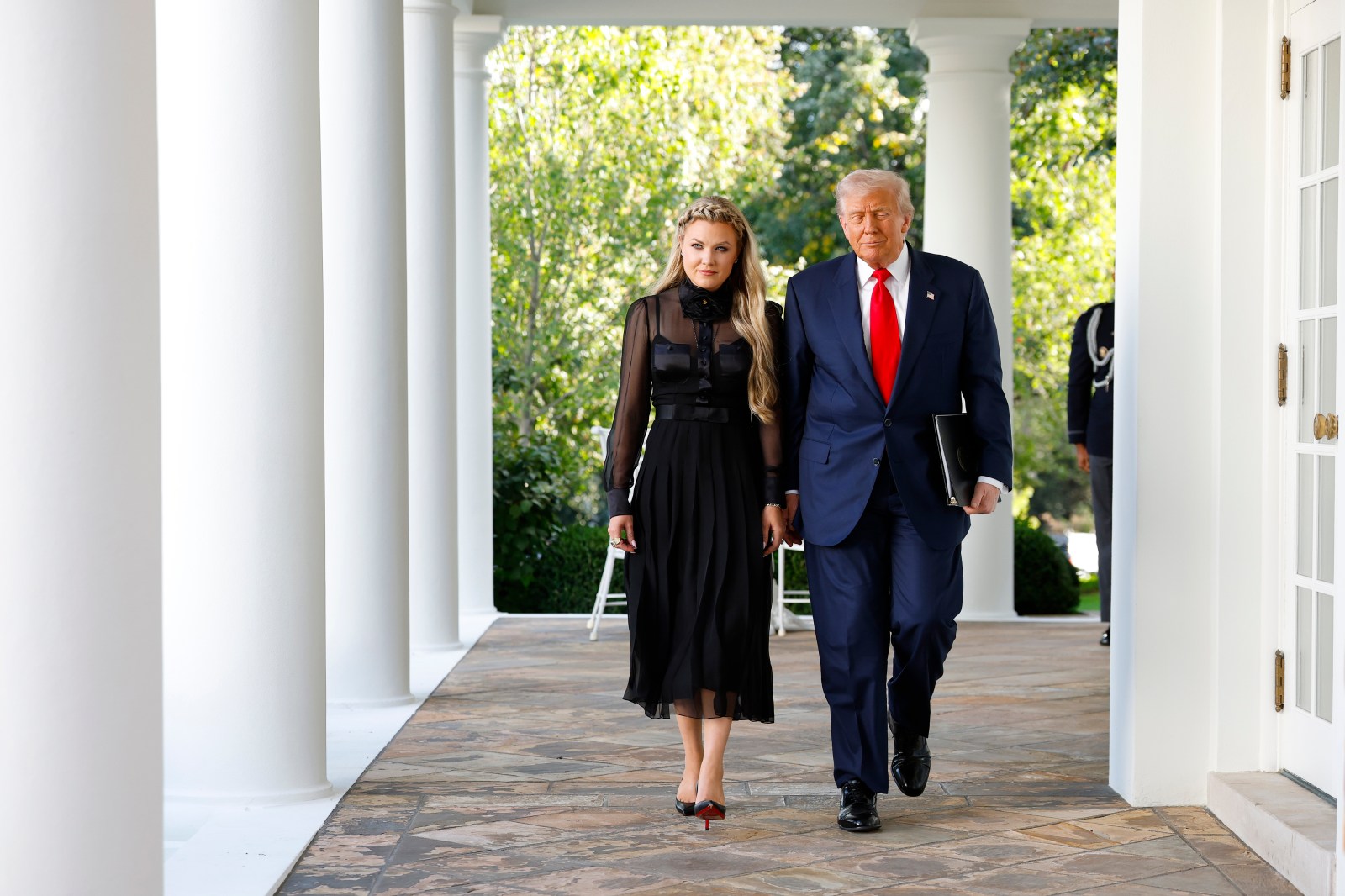 Erika Kirk arrives with President Donald Trump at the White House for the posthumous Presidential Medal of Freedom ceremony for Charlie Kirk