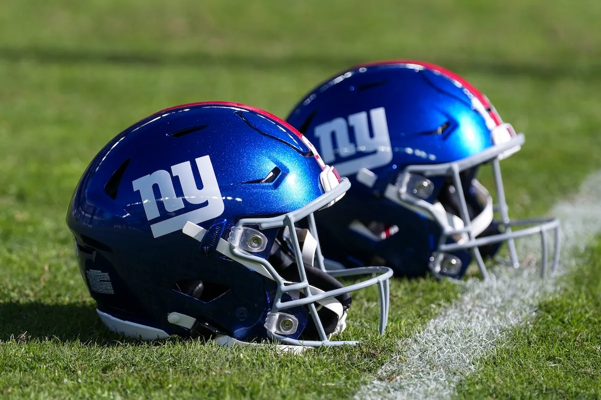 New York Giants helmets on football field for Eagles game