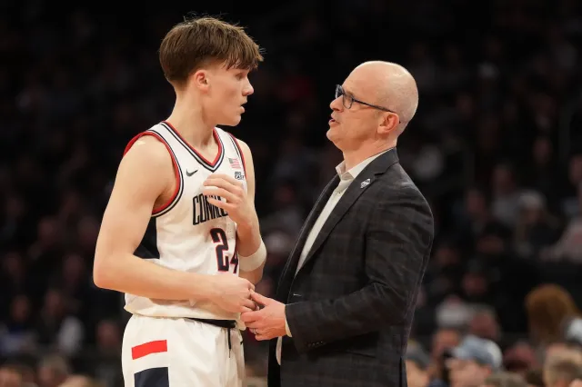 UConn freshman Braylon Mullions talks with head coach Dan Hurley during Big East Tournament