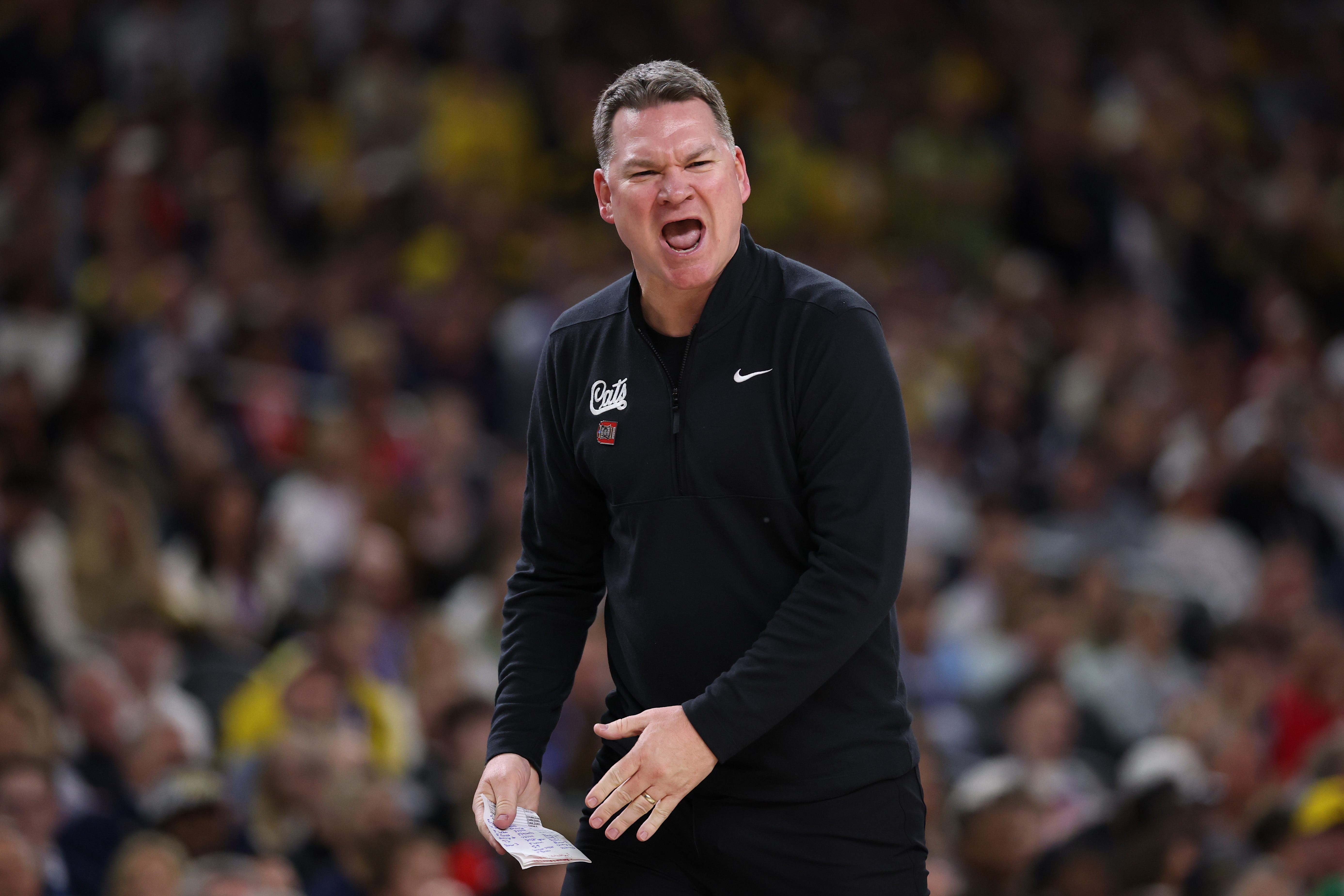 UNC Fans Delight in Tommy Lloyd and Arizona's Blowout Final Four Loss