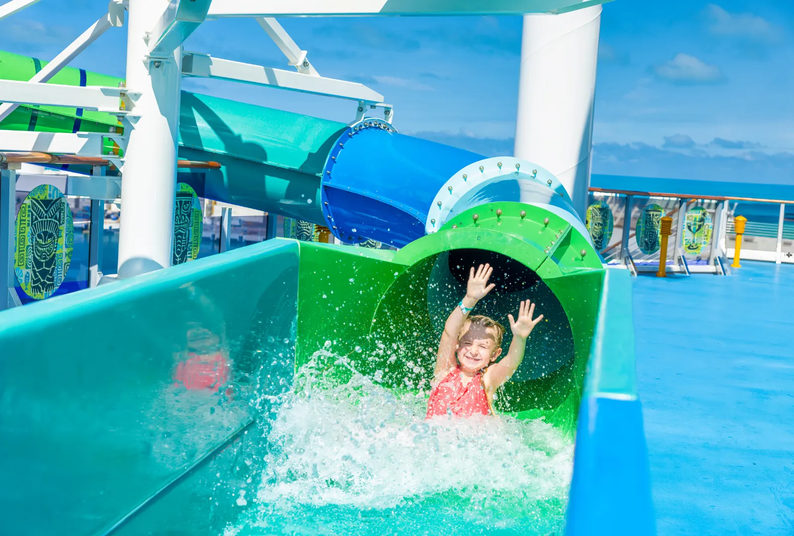 Girl on waterslide on Margaritaville at Sea ship