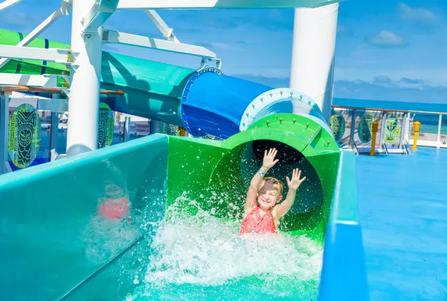 Girl on waterslide on Margaritaville at Sea ship