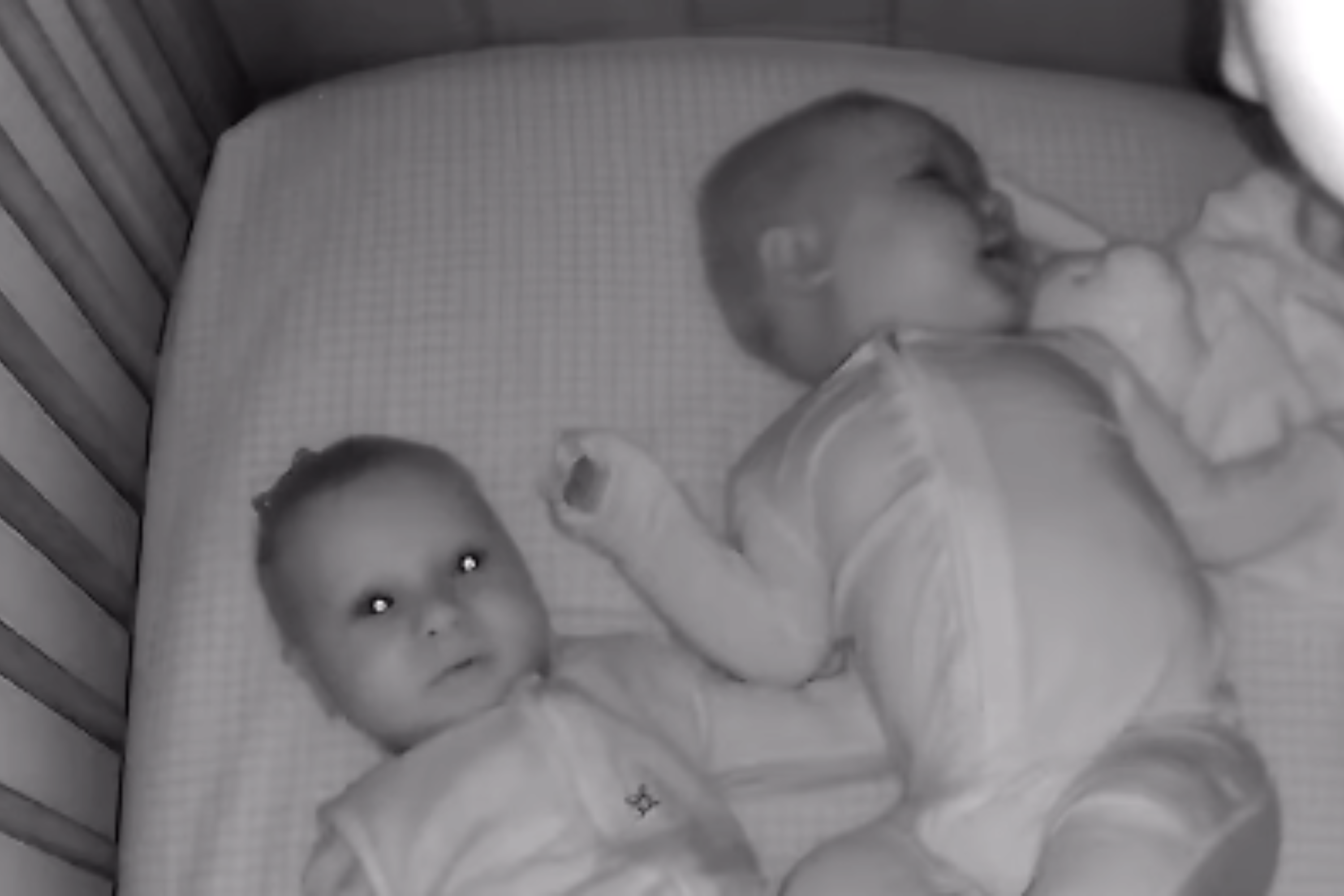 Twin Comforts Baby Brother in Crib—Then Camera Captures Something Amazing