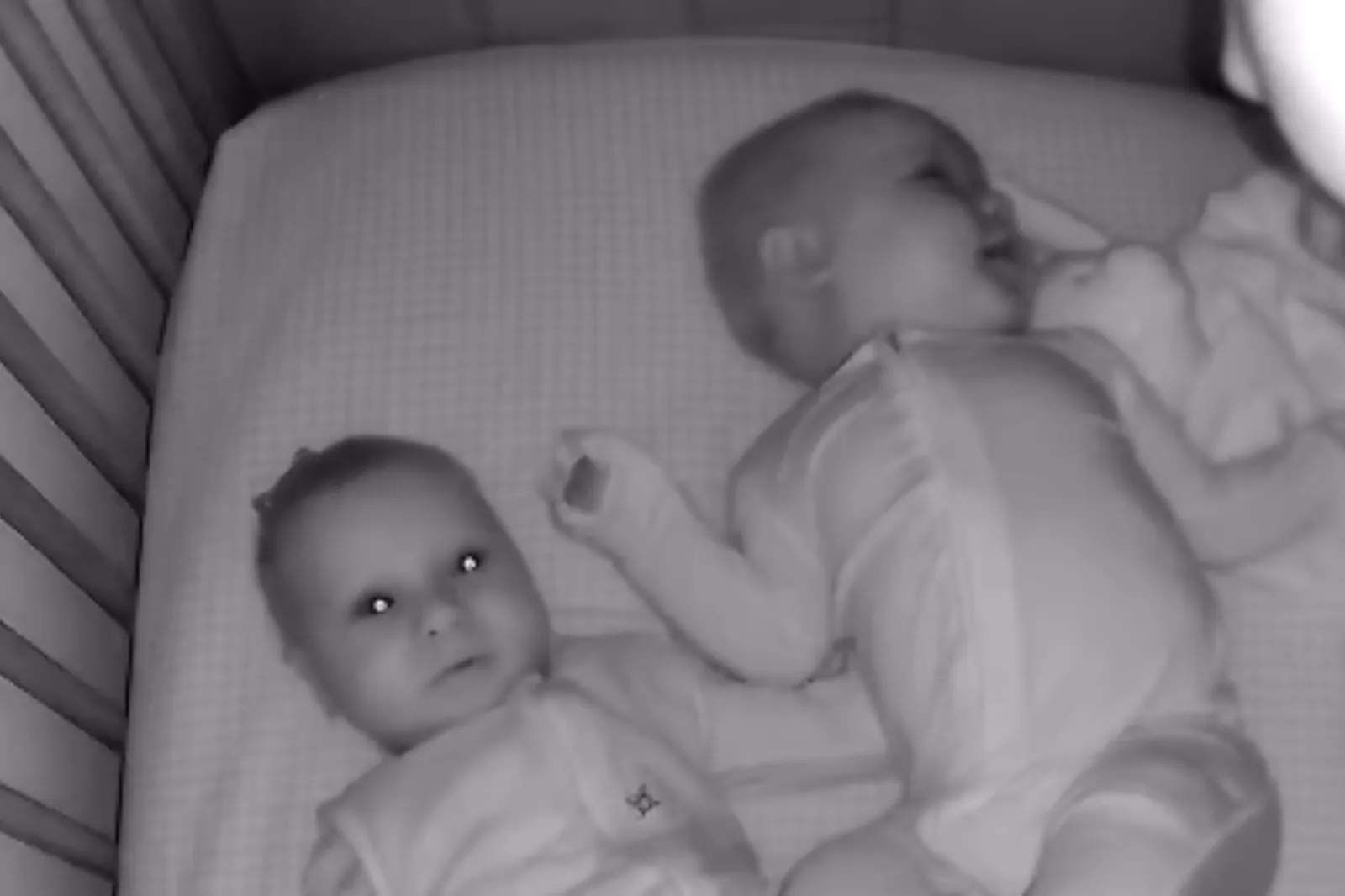 Twin Comforts Baby Brother in Crib—Then Camera Captures Something Amazing