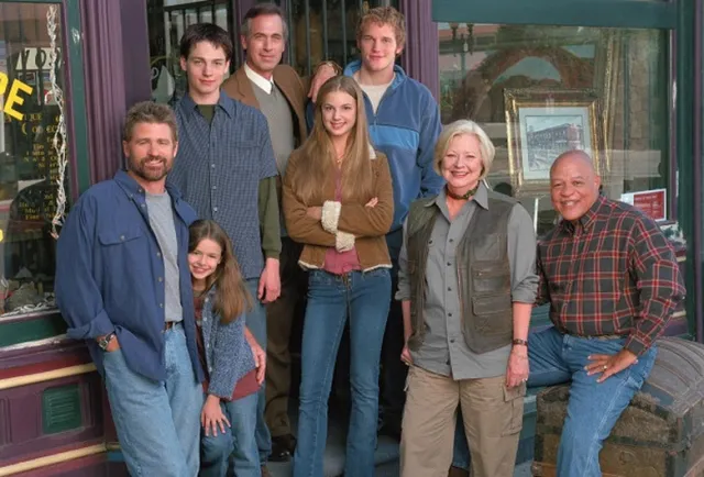 A group of people smiling