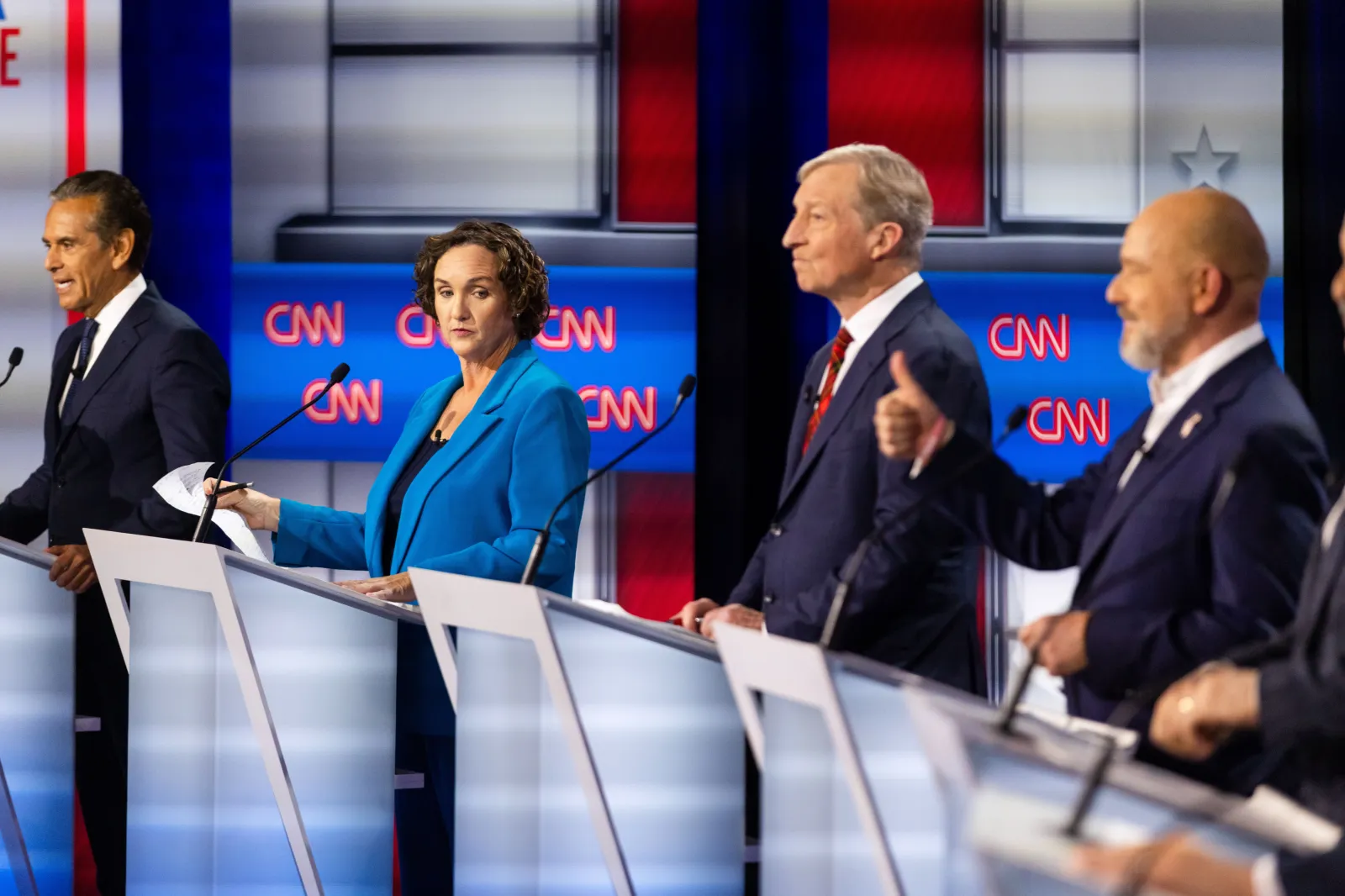 From left: Antonio Villaraigosa, Katie Porter, Tom Steyer and Steve Hilton participate in a California gubernatorial debate hosted by CNN at East Los Angeles College in Monterey Park, California, on May 5. (AP Photo/Ethan Swope)