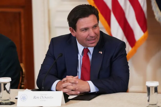Florida Gov. Ron DeSantis is seen before a roundtable discussion on college sports in the East Room of the White House, on March 6, 2026, in Washington.