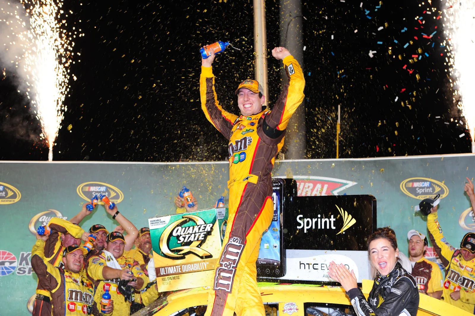Kyle Busch (18) Joe Gibbs Racing (JGR) M&Ms Toyota Camry driver celebrates winning the Inaugural Quaker State 400 National Association for Stock Car Auto Racing (NASCAR) Sprint Cup Series event on July 9, 2011, at Kentucky Speedway in Sparta, Kentucky. (Photo by David Allio/Icon Sportswire) (Icon Sportswire via AP Images)