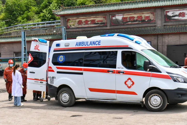 In this photo released by Xinhua News Agency, an ambulance is seen outside a coal mine in the aftermath of an explosion at Changzhi city's Liushenyu coal mine in Qinyuan county, northern China's Shanxi Province on Saturday, May 23, 2026. (Cao Yang/Xinhua via AP)