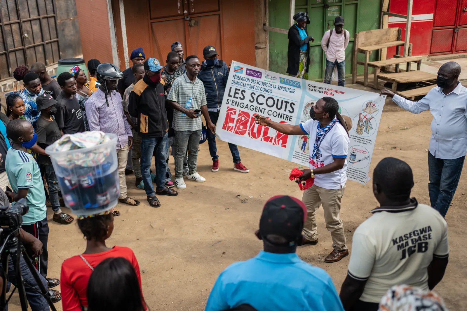 Francois Kasereka, a member of the Congo Scouts movement, speaks to people during a public sensitisation campaign amid the Ebola outbreak in Bunia, Congo, on May 23. (AP Photo/Moses Sawasawa)