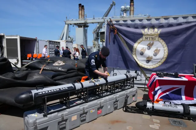 Royal Navy personnel inspect sea drones on RFA Lyme Bay in Gibraltar on May 22, 2026.