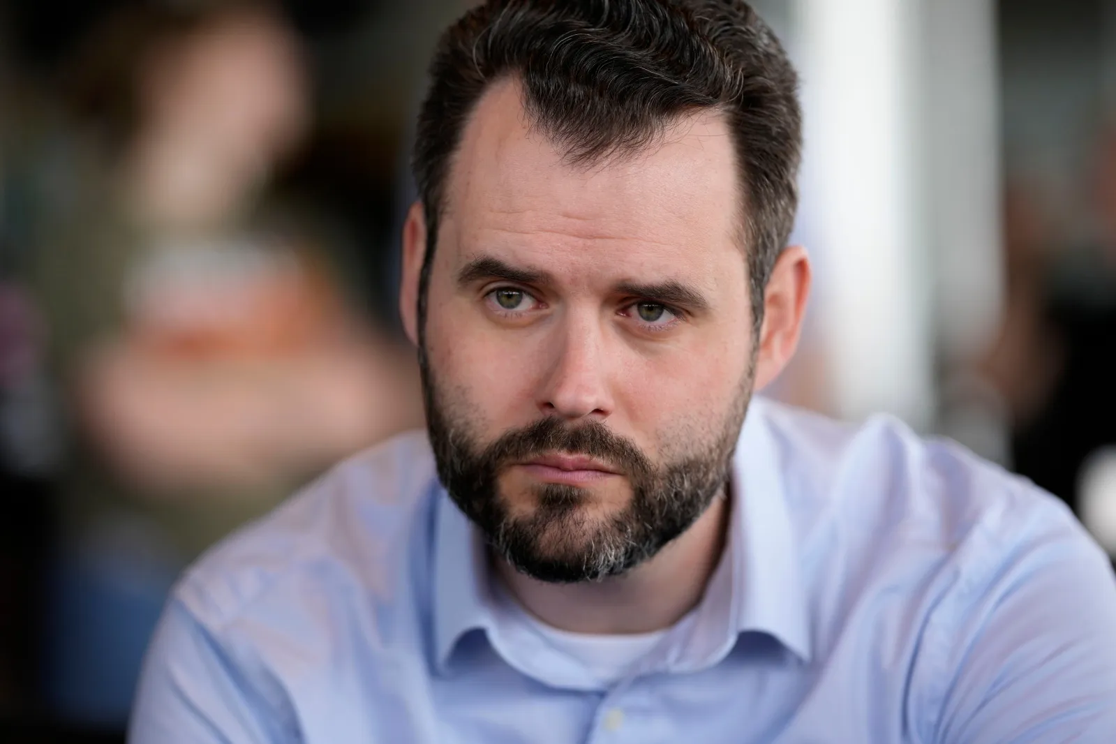 Iowa state Sen. Zach Wahls campaigns for the Democratic nomination for U.S. Senate during an event with local residents, Saturday, May 23, 2026, in Waukee, Iowa. (AP Photo/Charlie Neibergall)