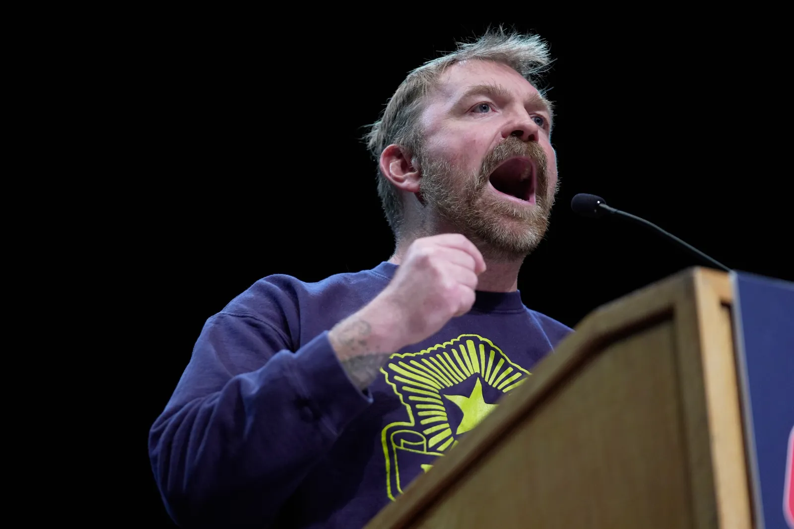 Graham Platner, Democratic candidate for U.S. Senate, speaks at an event hosted by Senator Bernie Sanders in Orono, Maine, on May 24. (AP Photo/Robert F. Bukaty)