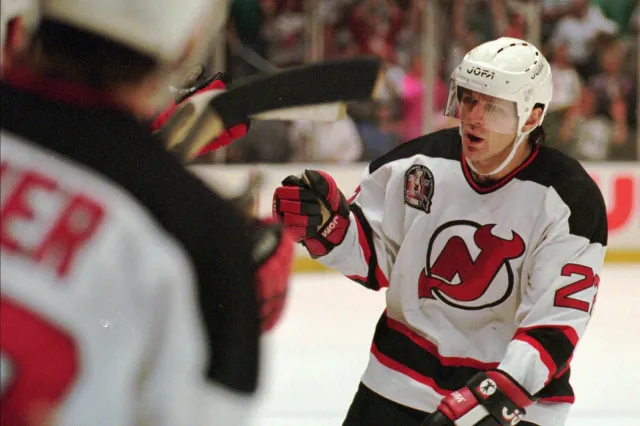 New Jersey Devils Claude Lemieux is greeted at the bench after scoring a goal in the first period of Game 3 of the NHL Stanley Cup Finals against the Detroit Redwings Thursday, June 22, 1995 at the Meadowlands in East Rutherford, N.ew Jersey.