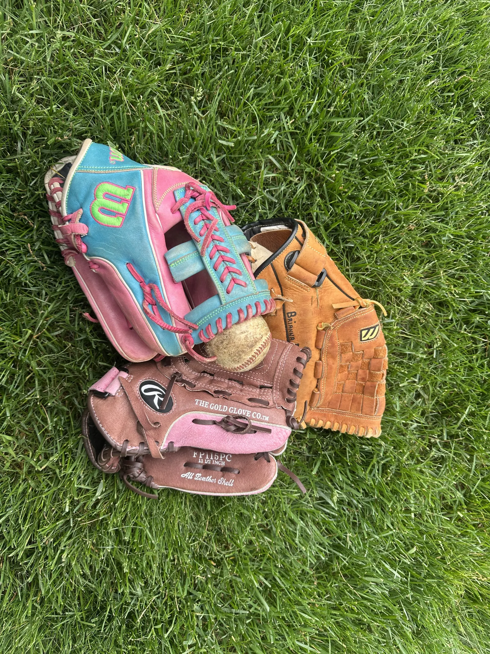 The gloves Alcorn and her son use to play catch.