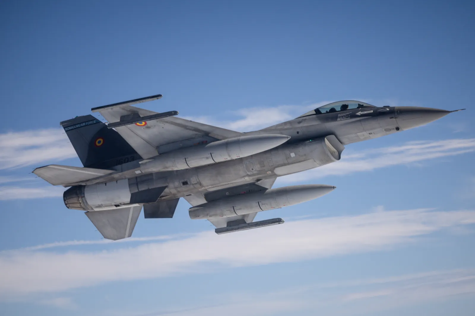 Photo from October 4, 2024 shows a Romanian Air Force F-16 fighter jet waiting for an aerial refuelling, while they participate in the 