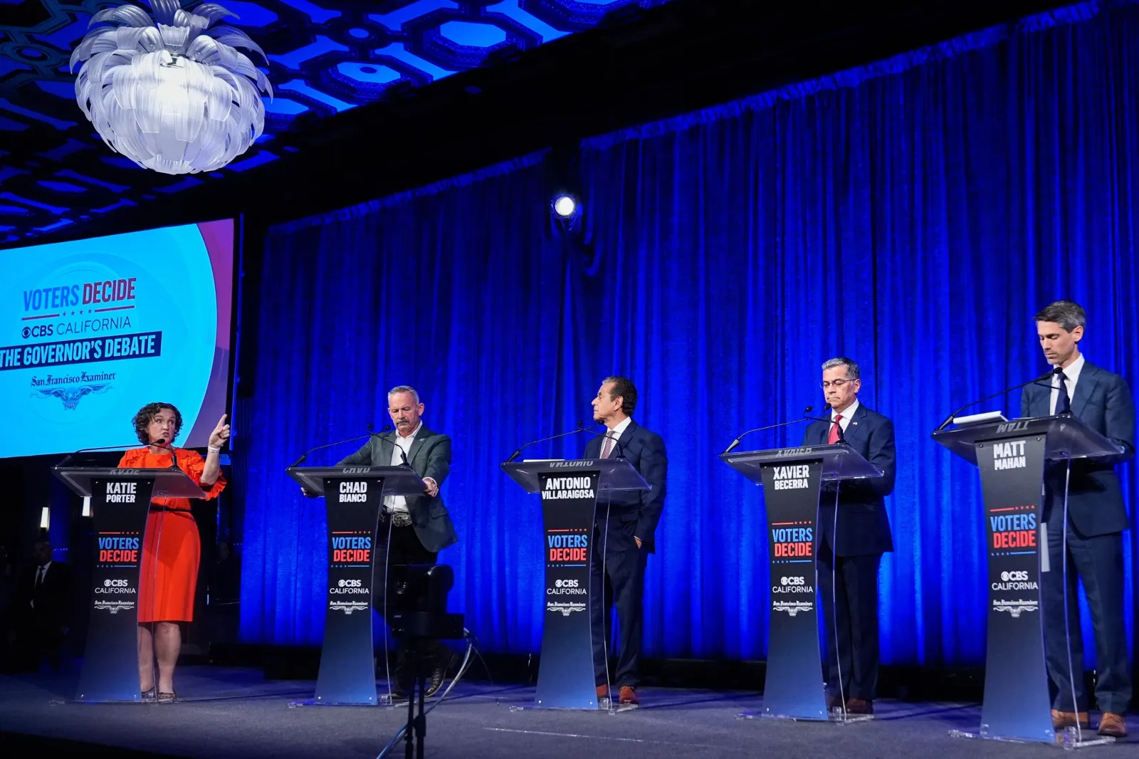 From left, Katie Porter speaks as Chad Bianco, Antonio Villaraigosa, Xavier Becerra and Matt Mahan listen during a California gubernatorial debate hosted by CBS Bay Area and the San Francisco Examiner in San Francisco, Thursday, May 14, 2026.