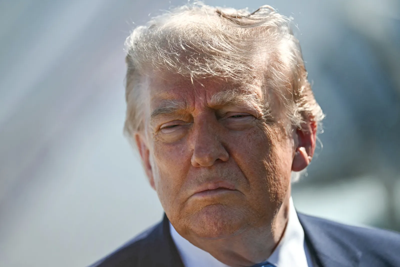 Donald Trump speaks to reporters before boarding Air Force One at Joint Base Andrews, Maryland on May 20, 2026.