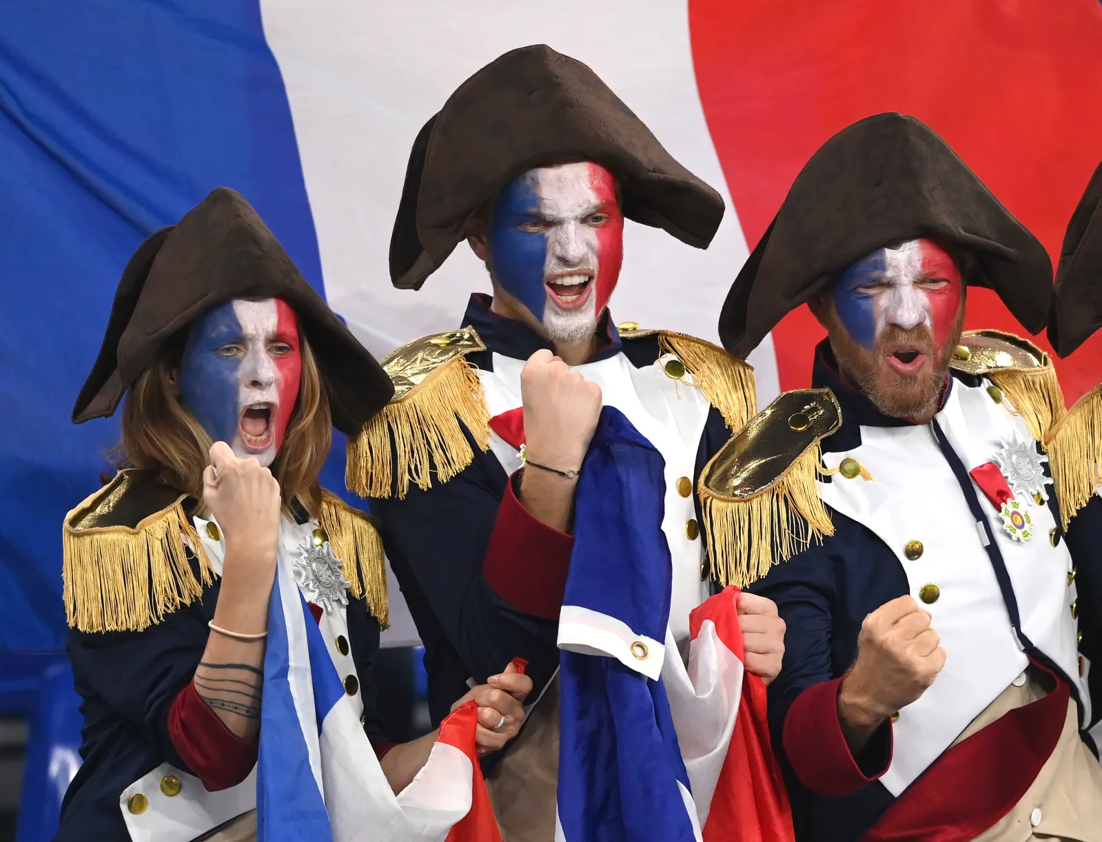 France fans with Napoleonic headwear cheer their team ahead of the FIFA World Cup Qatar 2022 Group D match against Denmark at Stadium 974 on November 26, 2022, in Doha, Qatar. (Photo by Stu Forster/Getty Images)