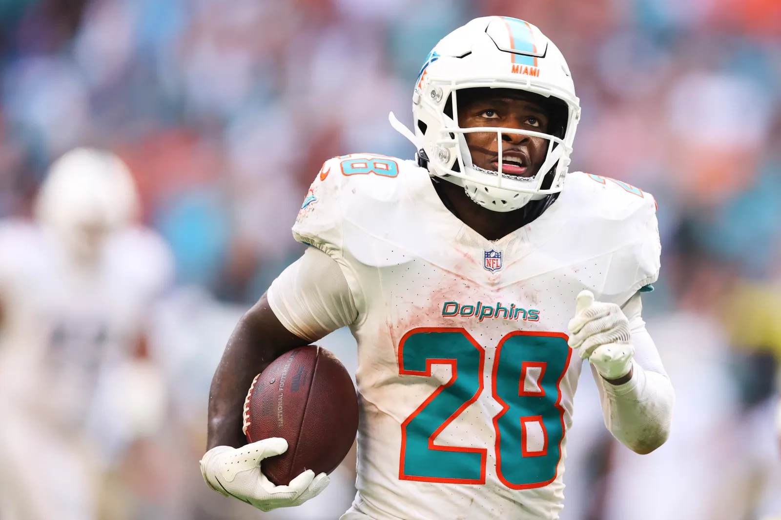 MIAMI GARDENS, FLORIDA - NOVEMBER 09: De'Von Achane #28 of the Miami Dolphins carries the ball for a touchdown against the Buffalo Bills during the fourth quarter of the game at Hard Rock Stadium on November 09, 2025 in Miami Gardens, Florida. (Photo by Megan Briggs/Getty Images)