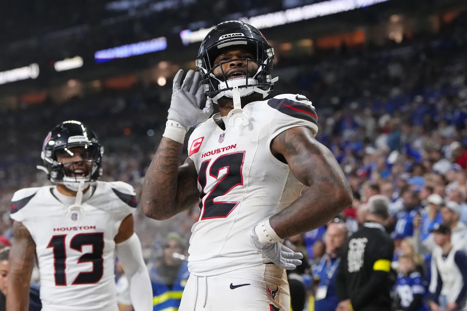 INDIANAPOLIS, INDIANA - NOVEMBER 30: Nico Collins #12 of the Houston Texans celebrates after his rushing touchdown against the Indianapolis Colts during the fourth quarter at Lucas Oil Stadium on November 30, 2025 in Indianapolis, Indiana. (Photo by Dylan Buell/Getty Images)