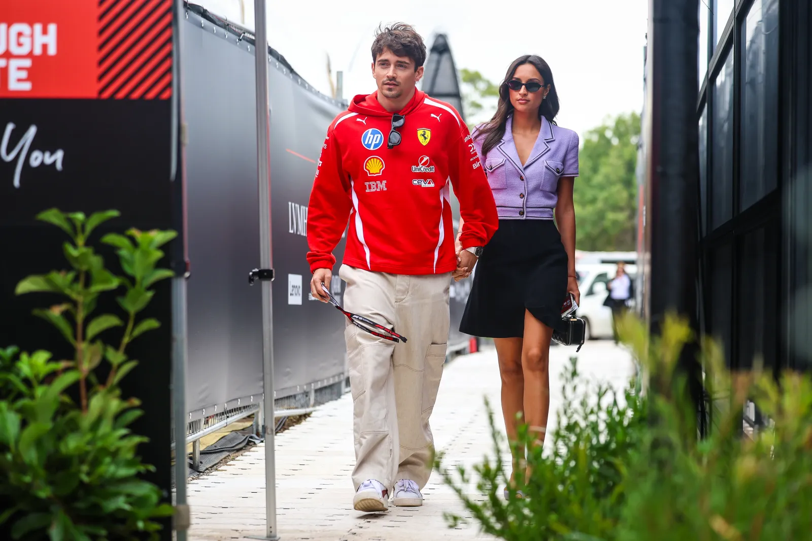 Ferrari driver Charles Leclerc, left, with his wife Alexandra Leclerc on March 7, 2026, in Melbourne, Australia.