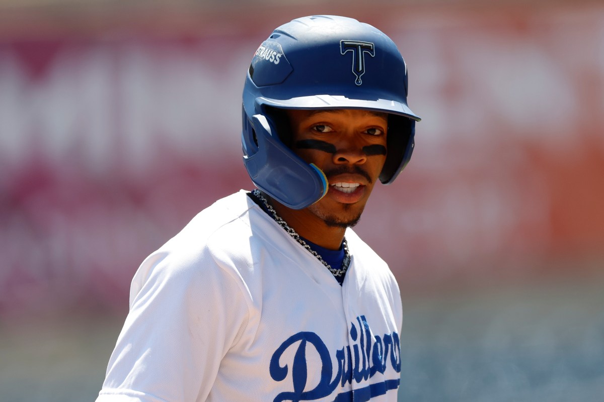 Dodgers Prospect Injures Knee While Jumping Out of Bat Dog's Way