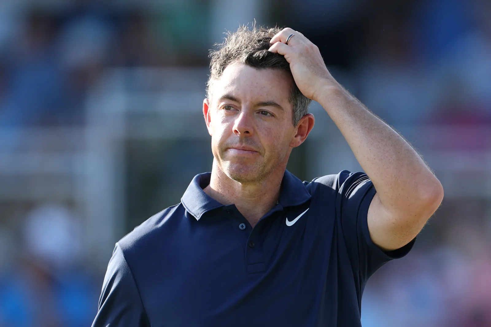 NEWTOWN, PENNSYLVANIA - MAY 17: Rory McIlroy of Northern Ireland looks on from the 18th green during the final round of the PGA Championship at Aronimink Golf Club on May 17, 2026 in Newtown, Pennsylvania. (Photo by Andrew Redington/Getty Images)